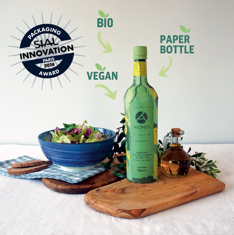 AEONS Bottle on a wooden board with salad and bread, featuring Sial Innovation Award logo.